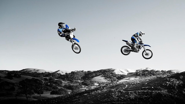 Motorcycles flying over mountains reflection free wallpaper for desktop - medium preview image