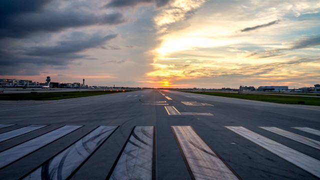 Runway sunset clouds sky background free wallpaper for desktop - medium preview image