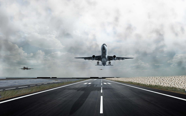 Plane flying runway cloudy sky free wallpaper for desktop - medium preview image