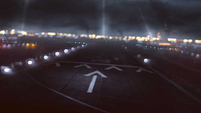 Blurry runway lights nighttime city free wallpaper for desktop - medium preview image