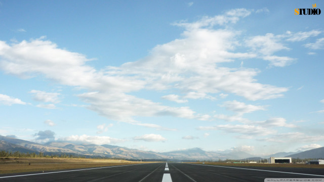 Road mountains sky clouds cars free wallpaper for desktop - medium preview image