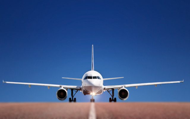 Large jetliner blue sky runway free wallpaper for desktop - medium preview image
