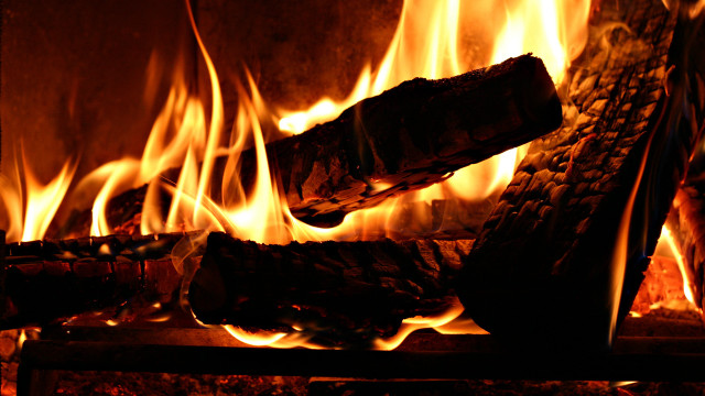 Fireplace burning logs flames cozy free wallpaper for desktop - medium preview image