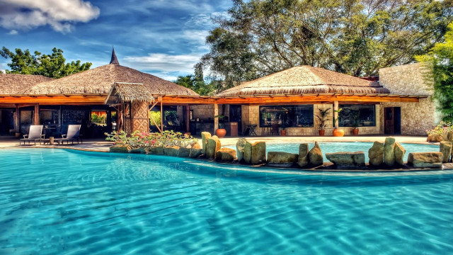 Large pool thatched roof stone free wallpaper for desktop - medium preview image