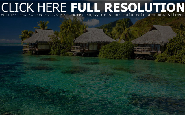 Huts hillside ocean lush green free wallpaper for desktop - medium preview image