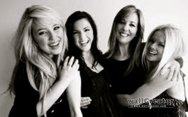 Women smiling hugging group friends free wallpaper for desktop - medium preview image