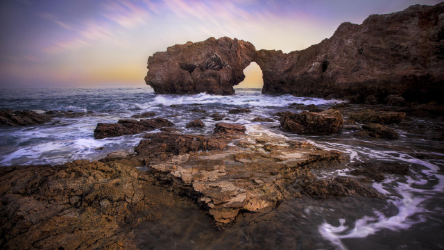 Rocky beach rock arch waves free wallpaper for desktop - medium preview image