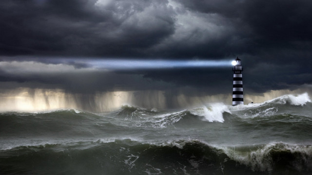 Lighthouse storm ocean light beam free wallpaper for desktop - medium preview image