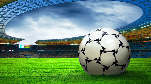 Soccer ball lush green field #7 free wallpaper for desktop - medium preview image