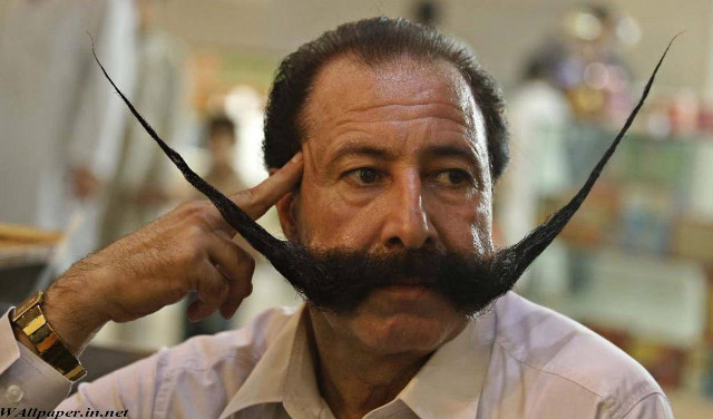 Man fake mustache head hand free wallpaper for desktop - medium preview image