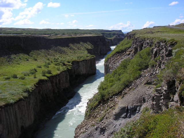River lush hillside cliff grass free wallpaper for desktop - medium preview image