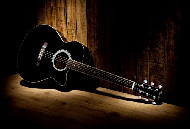 Guitar wooden table dark spotlight free wallpaper for desktop - medium preview image