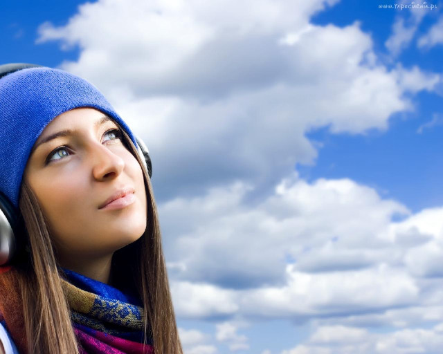 Woman headphones looking up blue free wallpaper for desktop - medium preview image