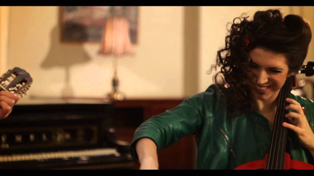 Woman holding guitar cellphone man free wallpaper for desktop - medium preview image