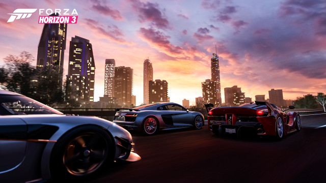 Cars driving street tall buildings free wallpaper for desktop - medium preview image