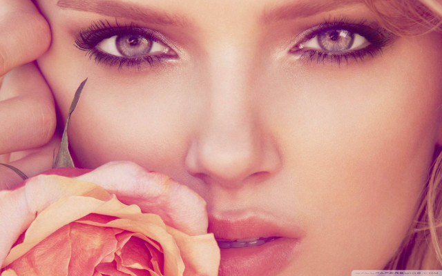 Woman holding flower cutting scissors free wallpaper for desktop - medium preview image