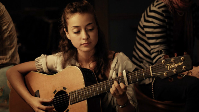 Woman playing guitar room zebra free wallpaper for desktop - medium preview image