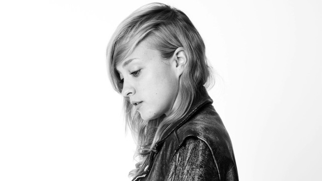 Young girl leather jacket cellphone free wallpaper for desktop - medium preview image