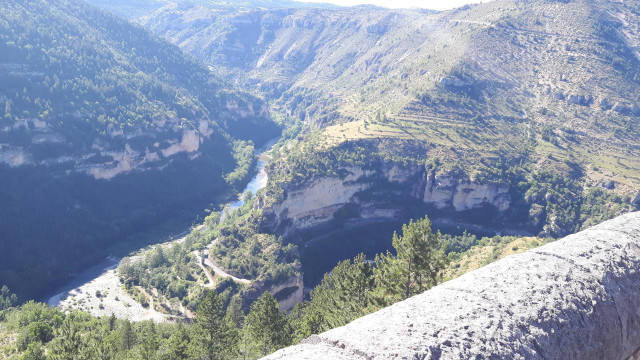 Valley river mountains person ledge free wallpaper for desktop - medium preview image