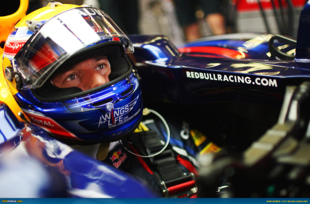 Man racing car helmet yellow free wallpaper for desktop - medium preview image