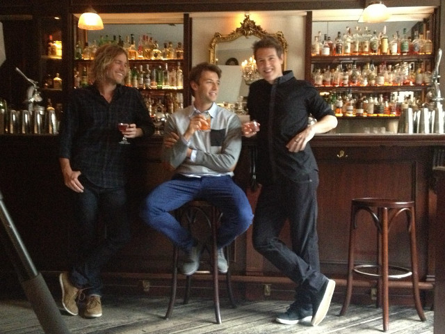 Three men sitting bar drinks free wallpaper for desktop - medium preview image