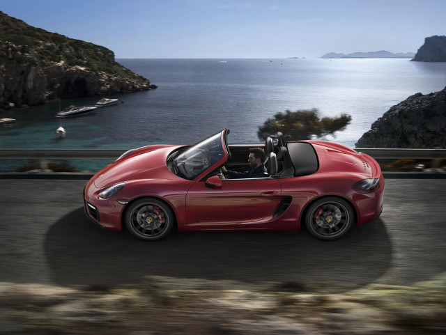 Red sports car ocean mountains free wallpaper for desktop - medium preview image