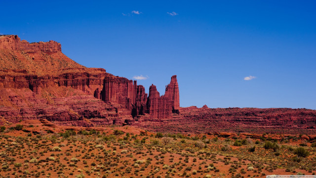 Large rock formation desert blue #2 free wallpaper for desktop - medium preview image