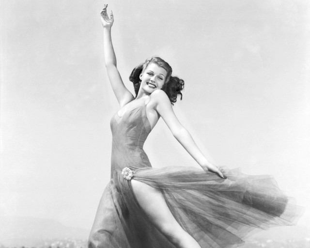 Woman dress posing arms up free wallpaper for desktop - medium preview image