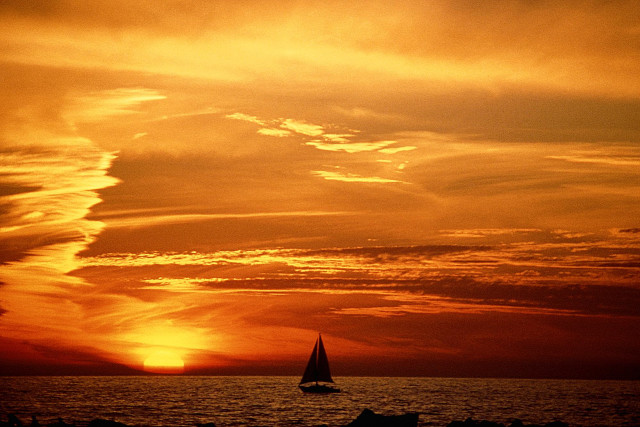 Sailboat ocean sunset dawn sky free wallpaper for desktop - medium preview image