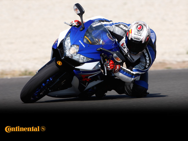 Person motorcycle race track helmet #4 free wallpaper for desktop - medium preview image