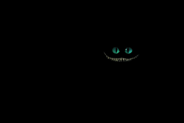 Black background green face glowing #2 free wallpaper for desktop - medium preview image