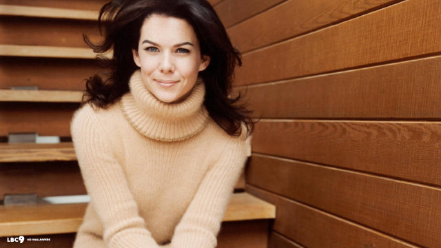 Woman tan sweater wooden wall free wallpaper for desktop - medium preview image