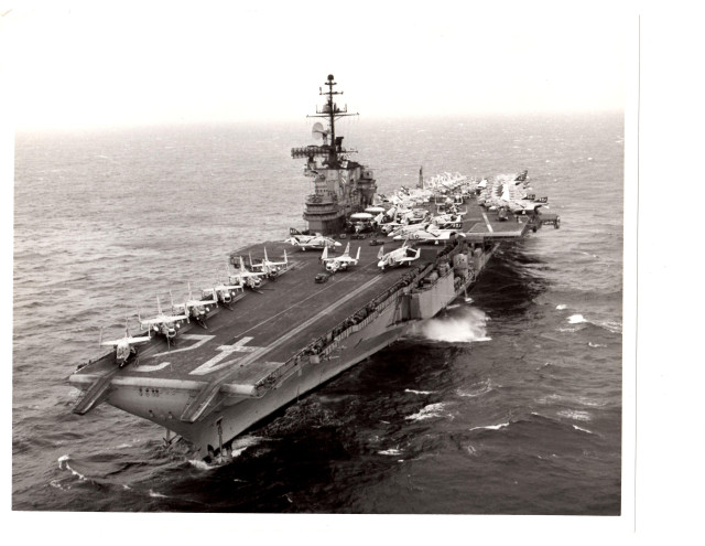 Large ship ocean smaller boats free wallpaper for desktop - medium preview image