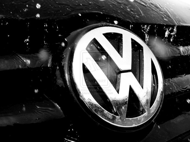 Volkswagen emblem closeup rain water free wallpaper for desktop - medium preview image