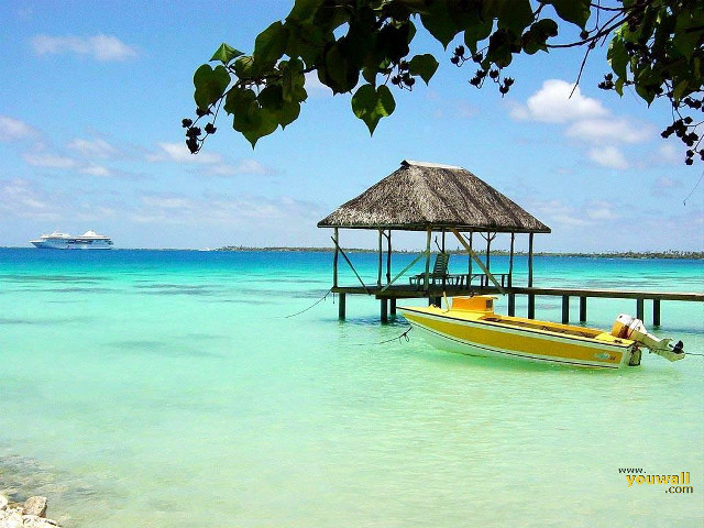 Boat docked pier tropical island free wallpaper for desktop - medium preview image