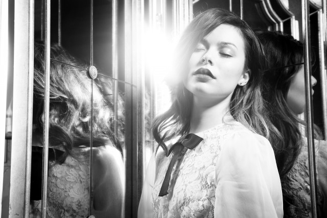 Woman cage eyes closed hair free wallpaper for desktop - medium preview image