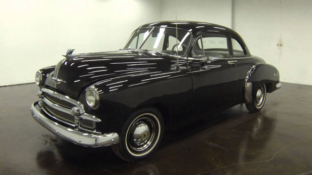 Black car garage white wall free wallpaper for desktop - medium preview image