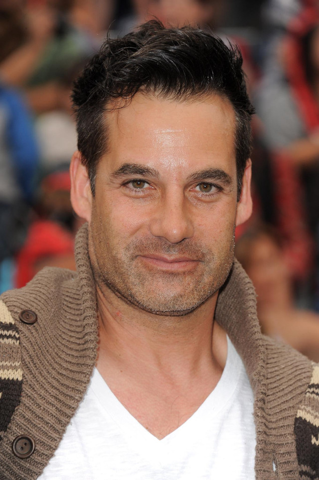 Man sweater smile crowd people free wallpaper for mobile - medium preview image