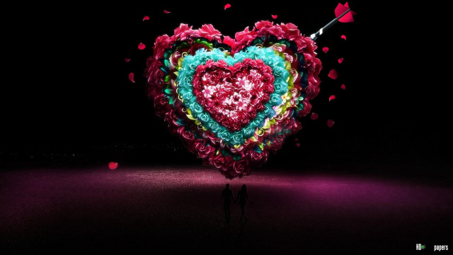 Heart shaped sculpture person holding free wallpaper for desktop - medium preview image