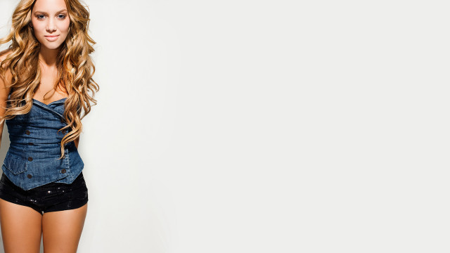 Woman denim outfit posing hair free wallpaper for desktop - medium preview image