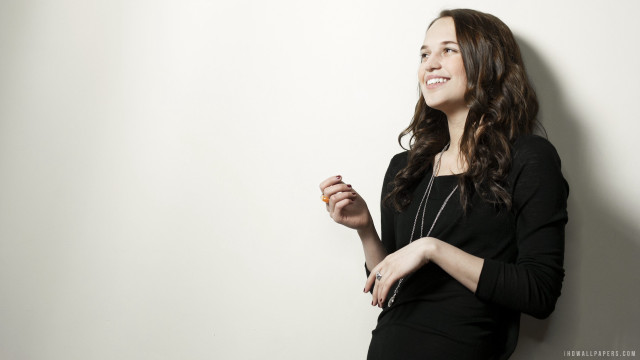 Woman smiling white wall hands free wallpaper for desktop - medium preview image