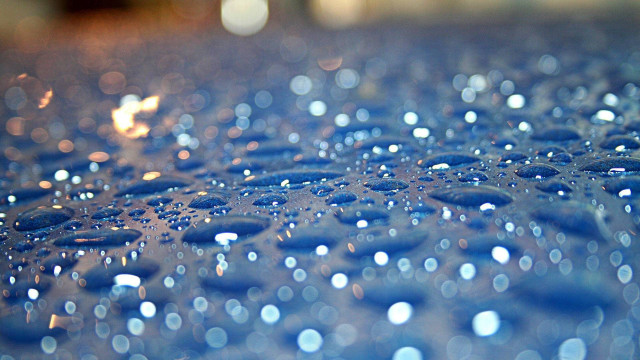 Water droplets blue surface macro free wallpaper for desktop - medium preview image