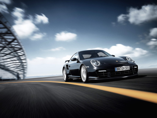 Black porsche driving road tall free wallpaper for desktop - medium preview image