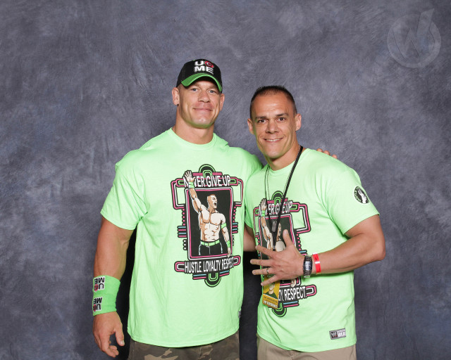 Two men green shirts microphone free wallpaper for desktop - medium preview image