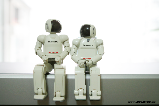 Two robots ledge window building free wallpaper for desktop - medium preview image