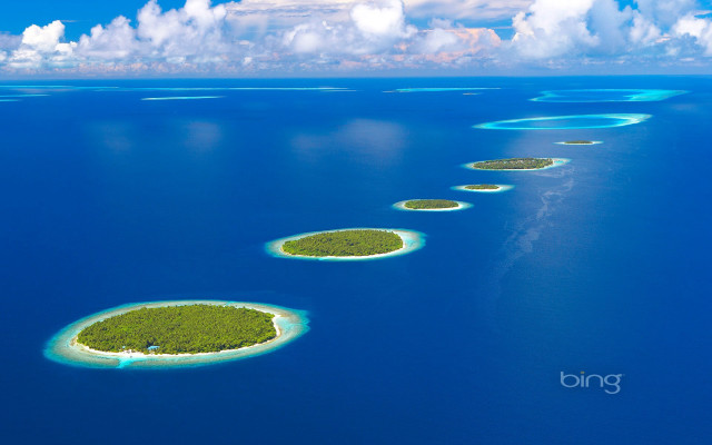 Small islands ocean plane flying free wallpaper for desktop - medium preview image