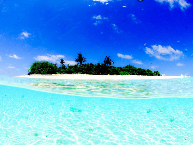 Tropical island boat ocean blue free wallpaper for desktop - medium preview image