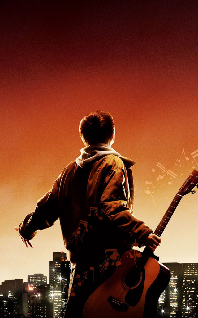 Man guitar city skyline night free wallpaper for mobile - medium preview image