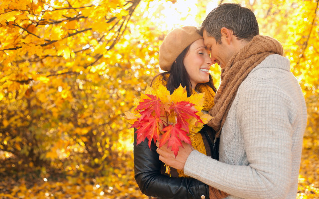 Man woman hugging fall leaves free wallpaper for desktop - medium preview image