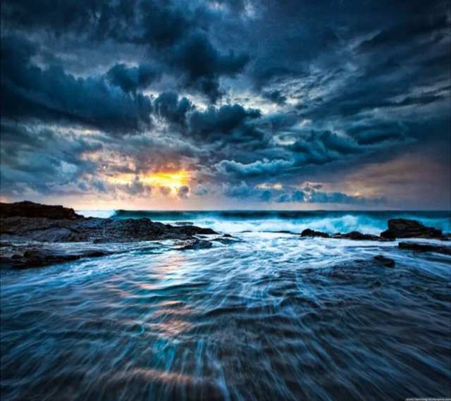 Sunset ocean waves clouds city free wallpaper for tablet - medium preview image